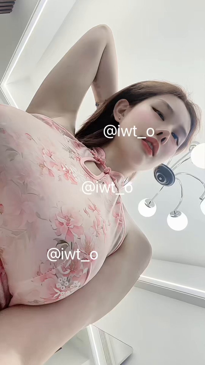 Busty beauty in a low-cut cheongsam selfie — exposed nipples, teasing