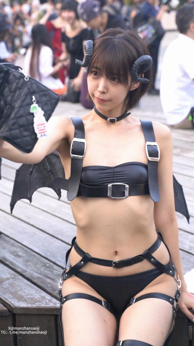 Sexy Demon Cosplayer at a Convention! Leather Bondage, Exposed Upper Thighs with Black Stockings and Panties