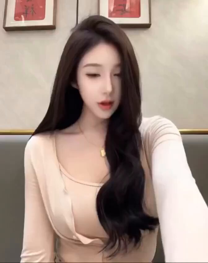 Long-haired Beauty Hotel Selfie Tease — Full Cleavage, Deep V Bust Swaying