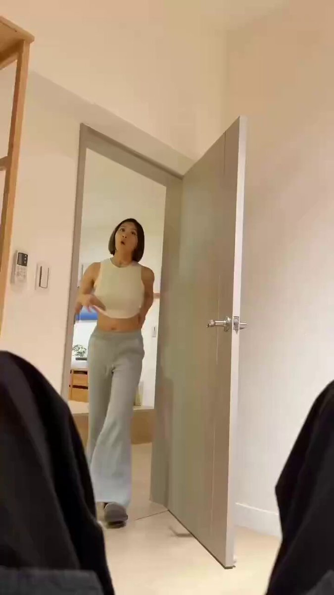 Sexy short-haired girl in a tight top and gray pants teasing tutorial — navel-baring, perky butt tempting you to fuck!