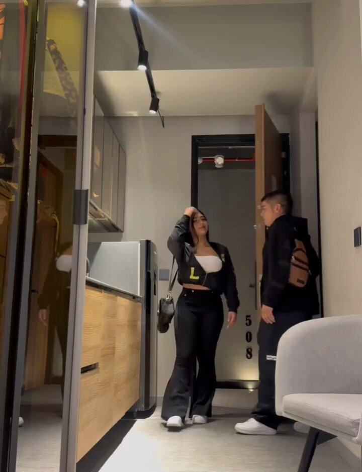 Long-legged black-stocking hottie seduces a macho man in a hotel kitchen! Perky ass sways waiting for a big cock to fuck hard