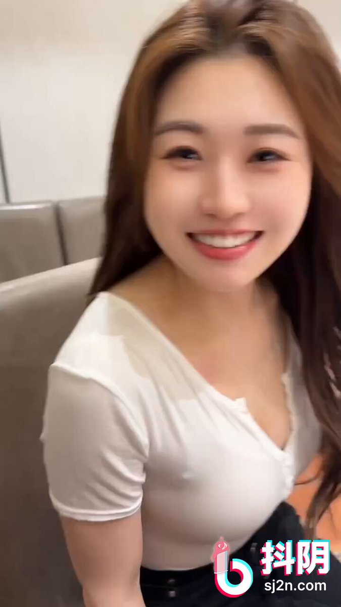 Innocent beauty in a white T-shirt with a low-cut tease! Fingers toying with black lace, irresistibly provocative!