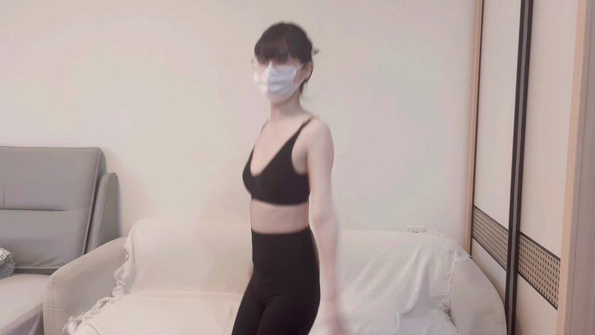 Masked Glasses Girl in Black Stockings and Tight Outfit Self-Touches Her Huge Breasts in a Seductive Dance