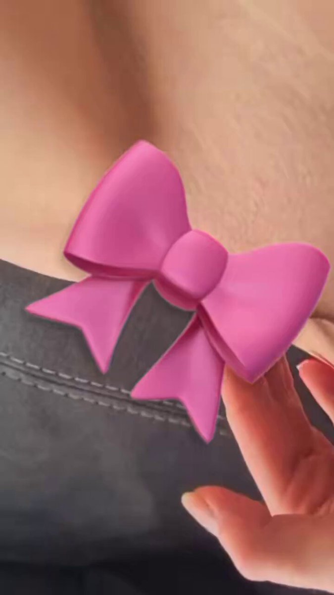 Pink Bow Temptation: Unfastening a Busty Young Woman