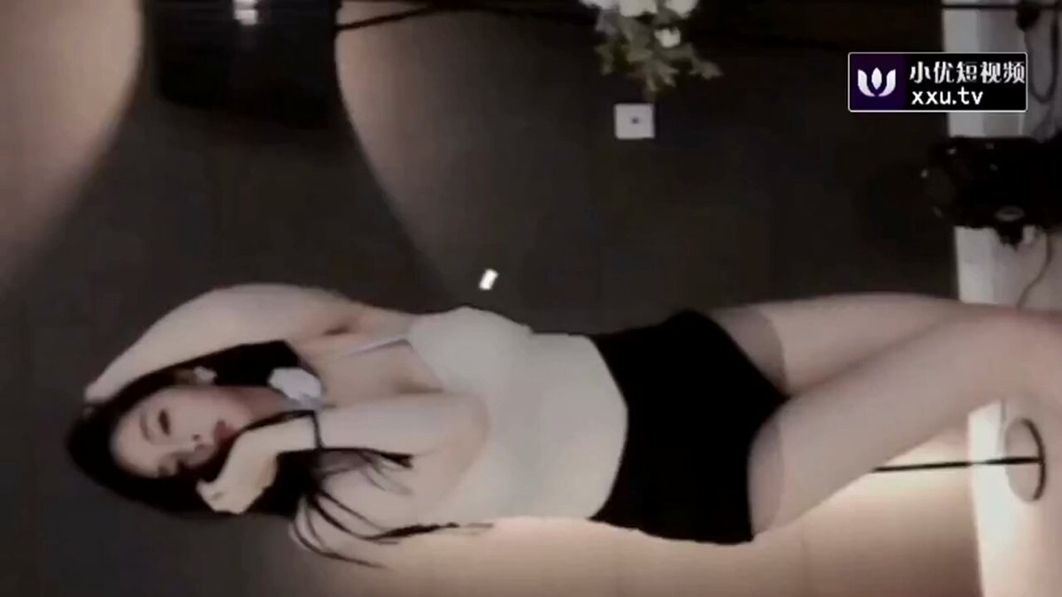 Seductive Vixen Strips on the Sofa, Revealing Her Breasts and Teasing Wildly!