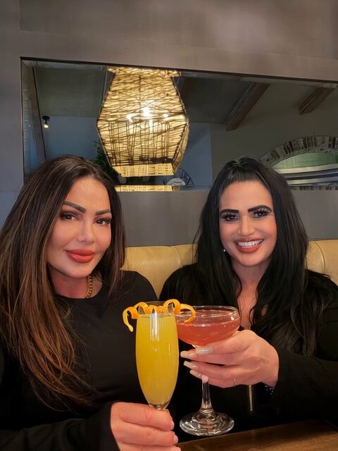 Two Gorgeous Mature Women at a Bar Toasting Temptation! Busty Sisters Flirt in a Nighttime Frenzy