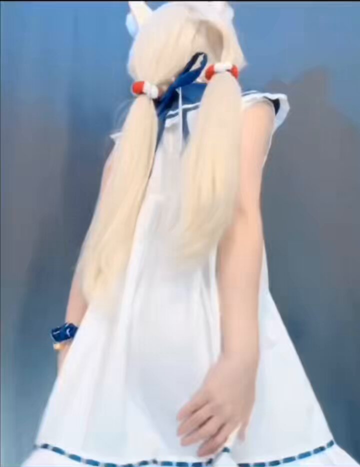 Bunny-eared blonde petite woman in a sailor uniform wildly shakes her perky ass! Thong digs into her sweet hole — ultra tempting