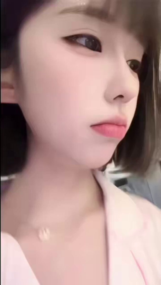 Cute Girl with Straight Bangs and Rosy Lips Temptingly Licking Her Lips, OL Uniform with Low-Cut Cleavage — Extremely Seductive!