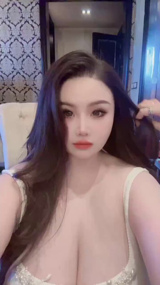 Busty beauty hotel selfie! Long-haired big-boobed girl flaunts her figure and overflows with seduction