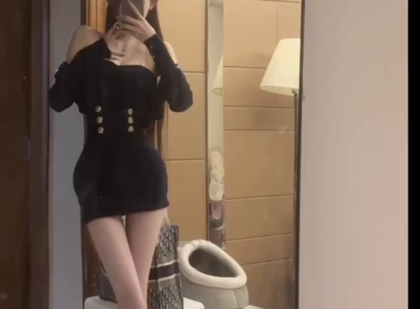 Bathroom selfie: sexy girl in black stockings and a mini skirt! Perky butt and long legs overflowing with temptation