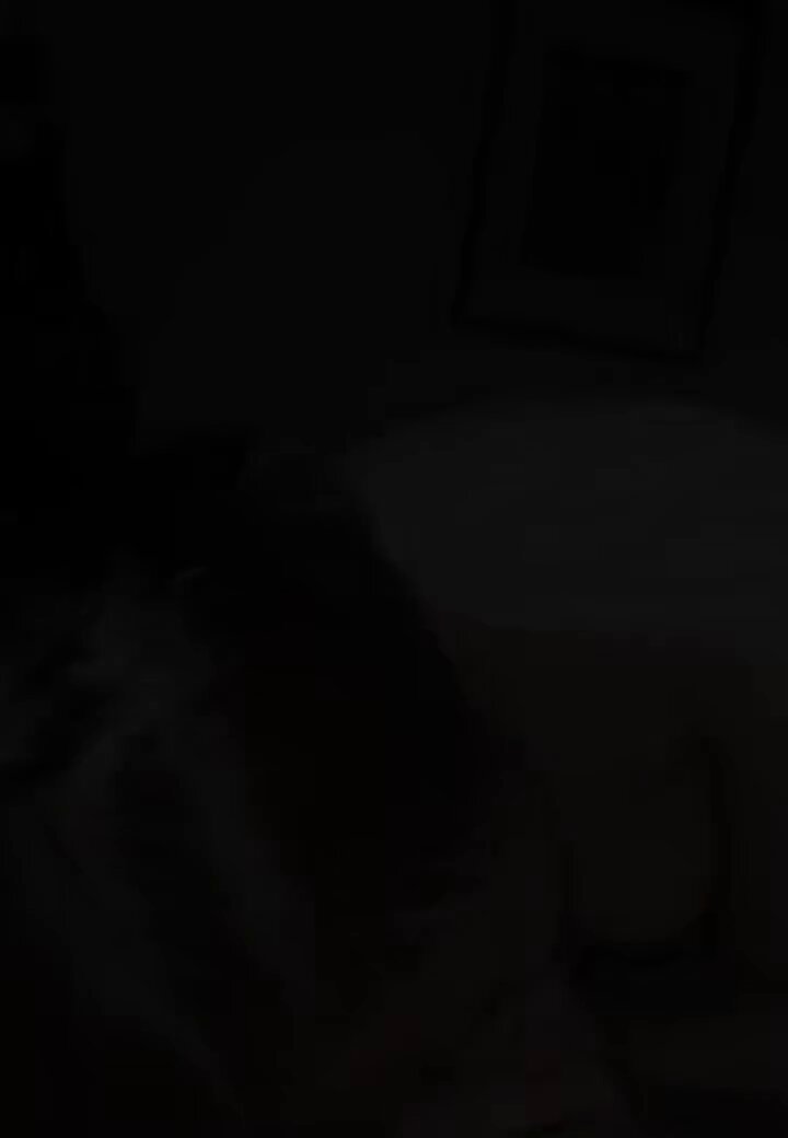 Horny girl in bed self-strokes a big cock, wildly licking her busty breasts