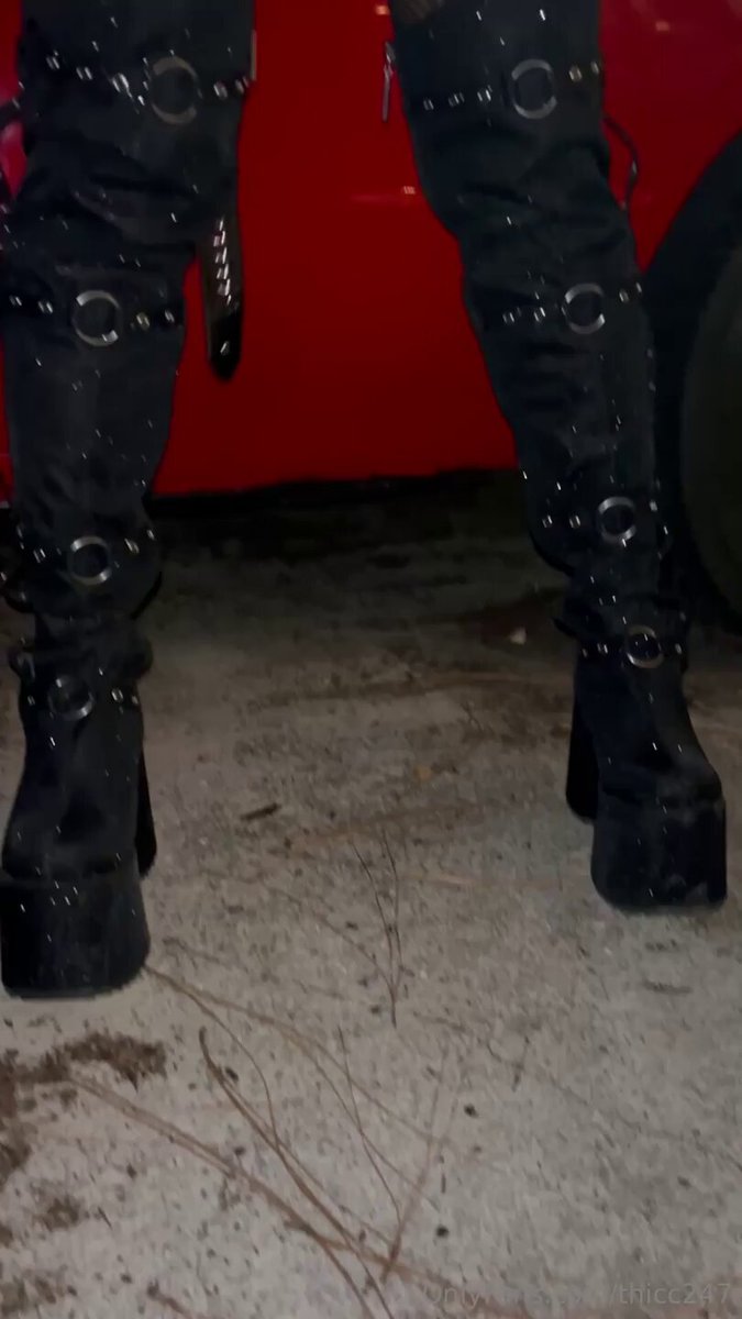 Tattooed hot girl in cat outfit flashes her butt and plays with a chain! Black thigh-highs and over-the-knee boots, perky ass—super tempting