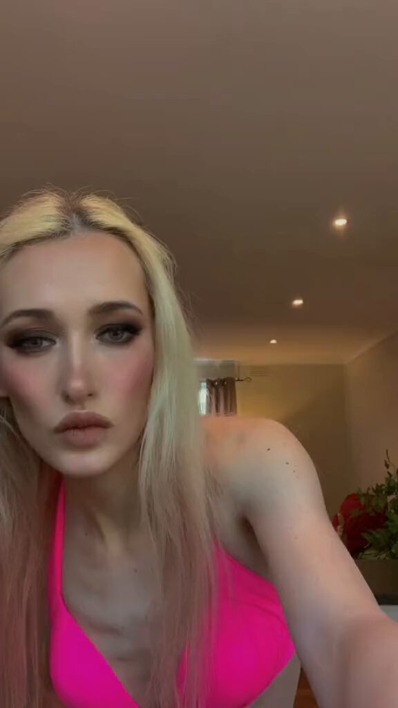 Blonde Bombshell in a Pink Bikini: Kitchen Tease & Hip-Swaying Show