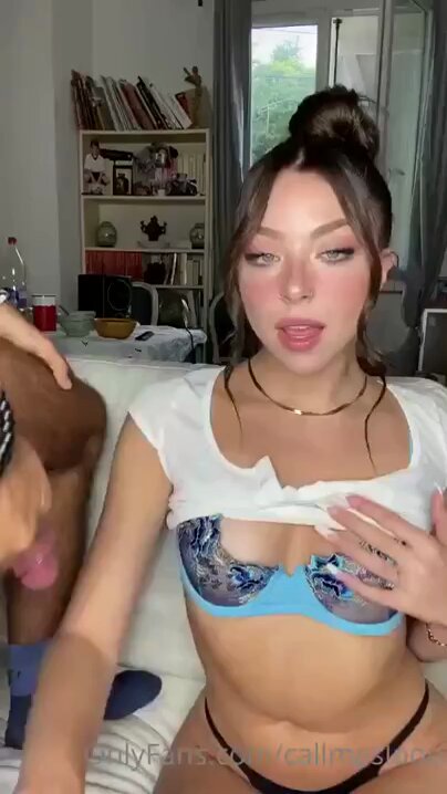 Sexy beauty gives a handjob on the sofa to a big cock — licking, sucking and playing until orgasm and squirting!