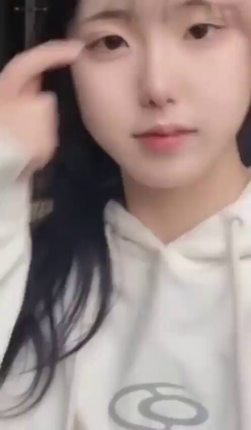 Bold Masturbation on the Stairs! Girl in White Pulls Aside Black Stocking Panties and Furiously Fingers Her Pussy