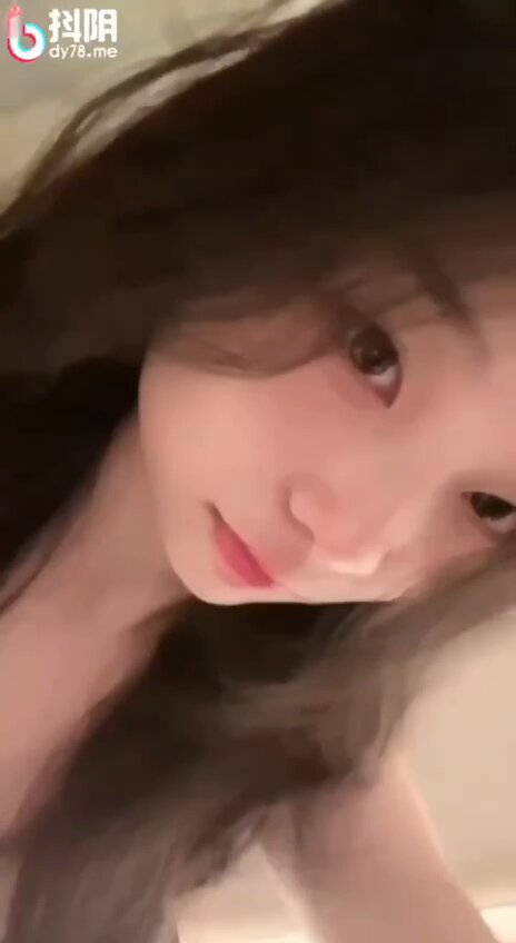 Long-Haired Beauty Teases with Tongue on Bed — Bare Big Breasts and Perky Butt for Wild Seduction