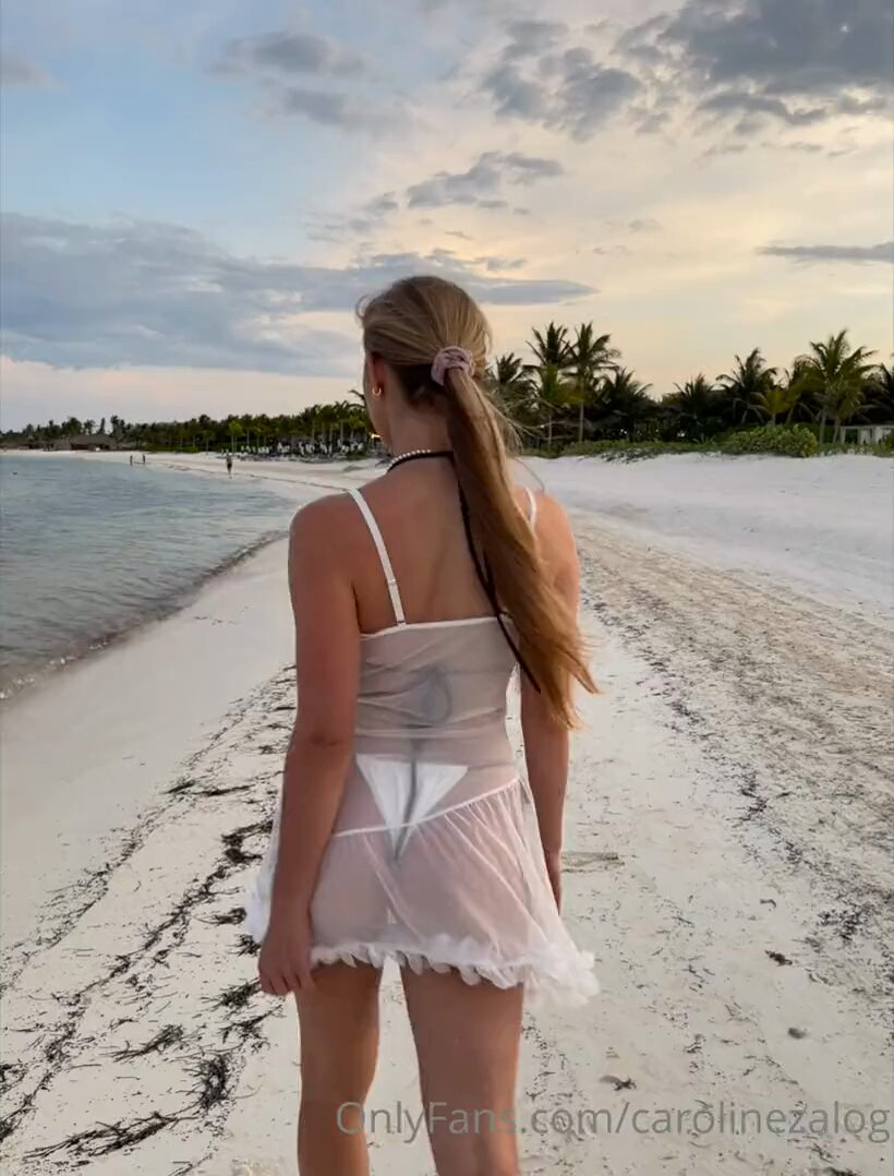 金髪美女がビーチで濡れて誘惑！透けるネグリジェでプリッとしたヒップと巨乳を披露