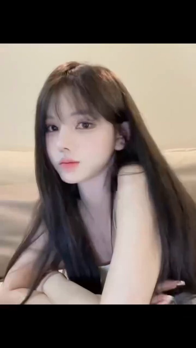 Innocent black long-straight beauty in a camisole tempting, self-touching breasts and moaning with mouth open