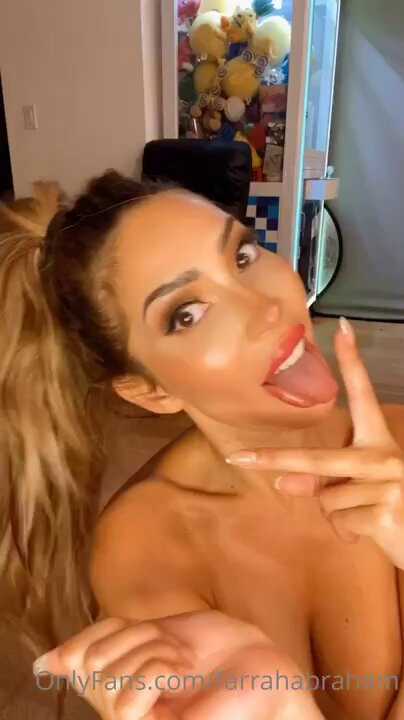 Latin babe bares huge breasts and perky butt, gyrating wildly and sticking her tongue out to tease — ultra seductive!