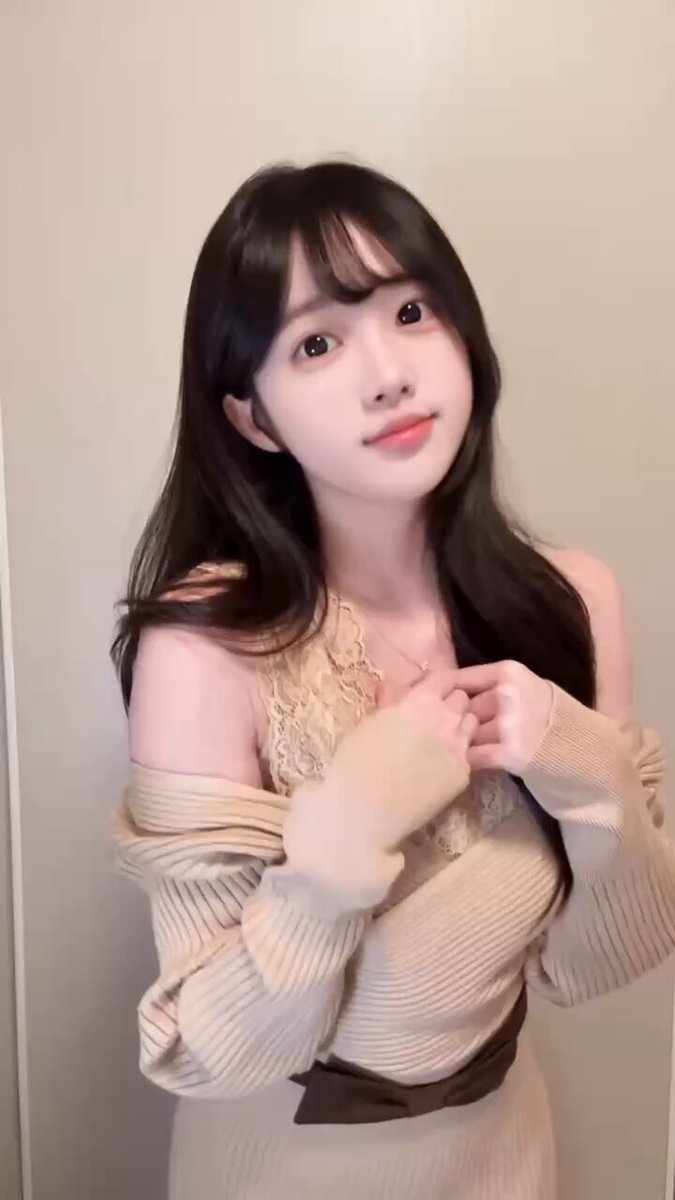 Sexy black-haired beauty makes a heart gesture seductively! Off-shoulder lace outfit tempts with finger play