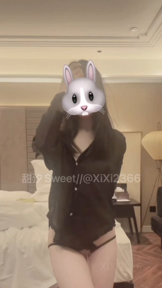 Hotel Bunny Girl in Black Stockings and Sheer Shirt Shows Off Long Legs and Perky Butt