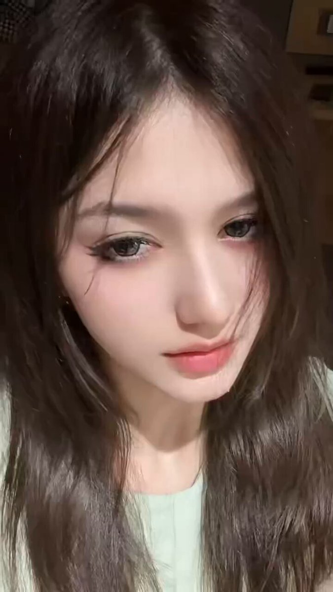 Innocent Long-Haired Beauty Seductive Selfie — Green Top Can't Hide Her Lewdness