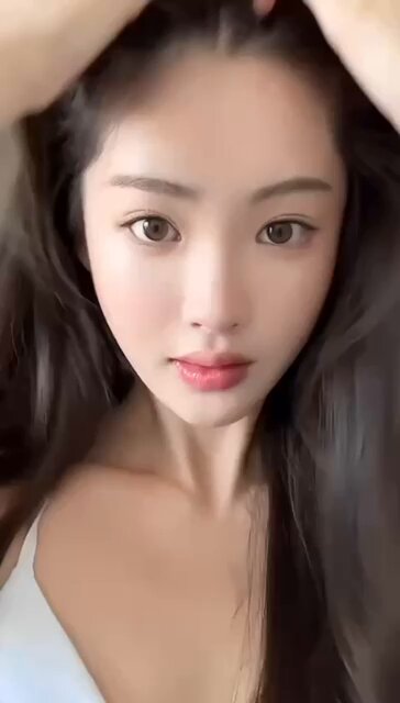 Sultry Fox-like Long-Haired Beauty Seductive Selfie — Strappy Top, Bouncing Huge Breasts