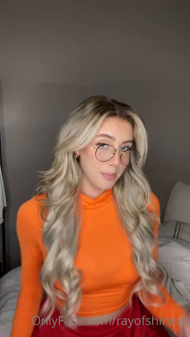 Blonde Glasses Girl in Orange Tight Top Frenzily Licks a Giant Black Dildo, Masturbates to Orgasm