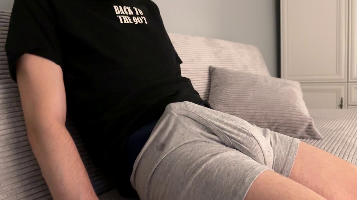 Back To The 90s — Big-dick guy jerks off on the bed! Gray shorts show a huge cock outline, super tempting