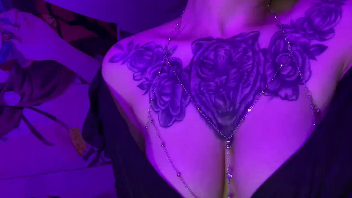 Tattooed Naughty Girl Gyrating Her Busty, Perky Butt Under Purple Lights