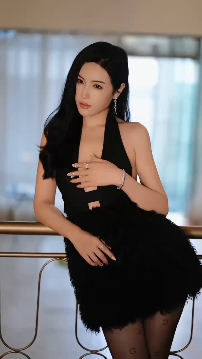 Black-Stocking V-Neck Foxy Temptress with Exposed Back, Perky Butt and Long Legs Awaiting Your Attention