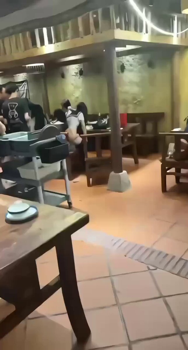 Sailor-Uniform Hotties Shaking Their Perky Butts in a Restaurant — Crowd Watches as Butt Gets Exposed in Candid Footage