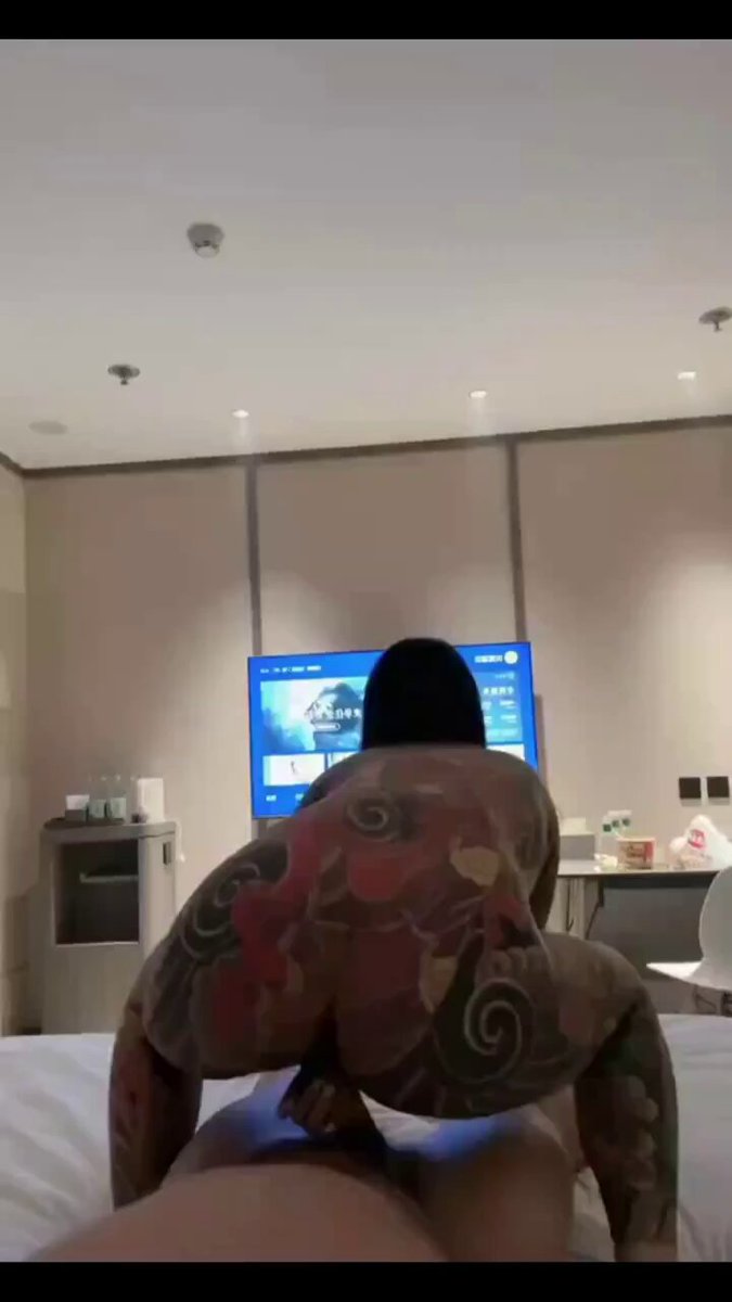 Tattooed hottie rides on a hotel bed — perky ass cowgirl and wild pounding, fat butt bouncing as juices spray!