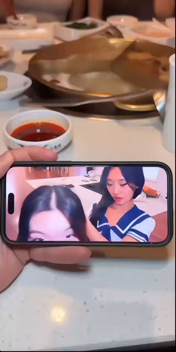 Under-the-Hotpot Table: Two Beautiful Legs Teasing — Sailor-Uniform Hotties' Lewd Selfie Caught on Phone