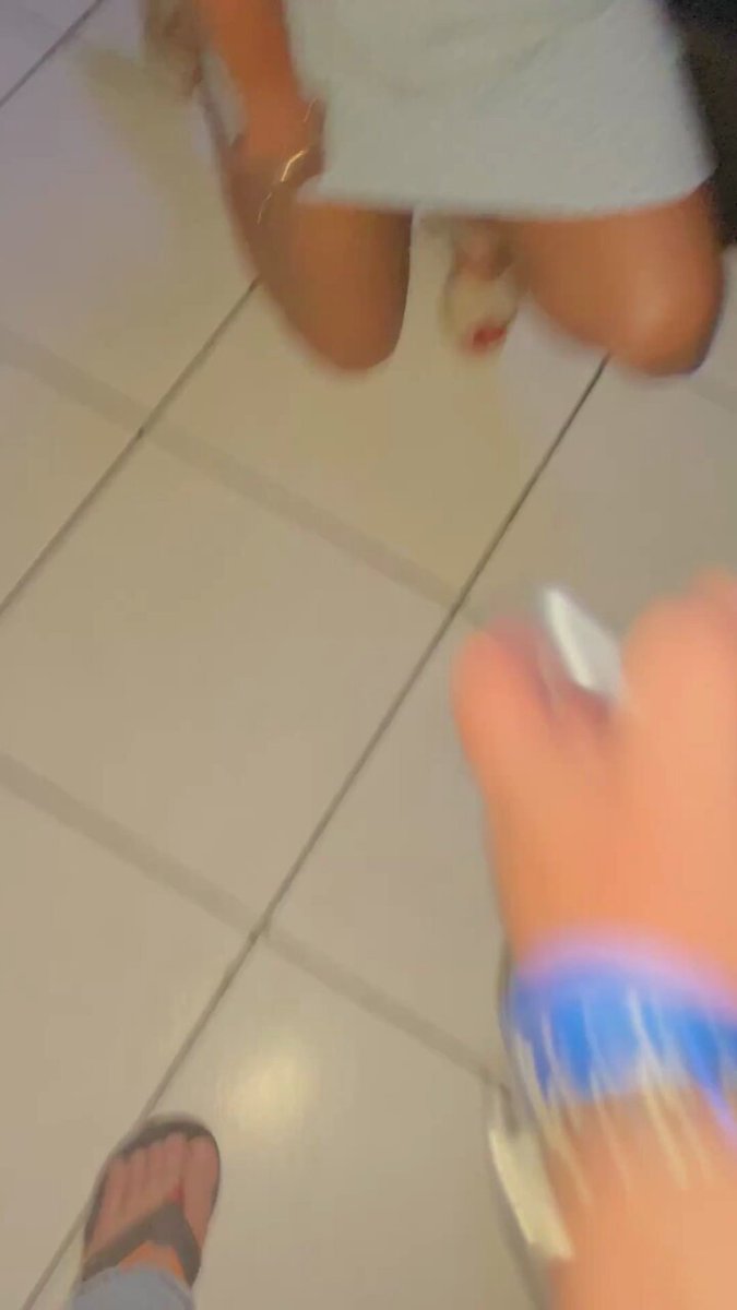 Sexy white girl kneels to lick a big black cock and greedily swallows cum!