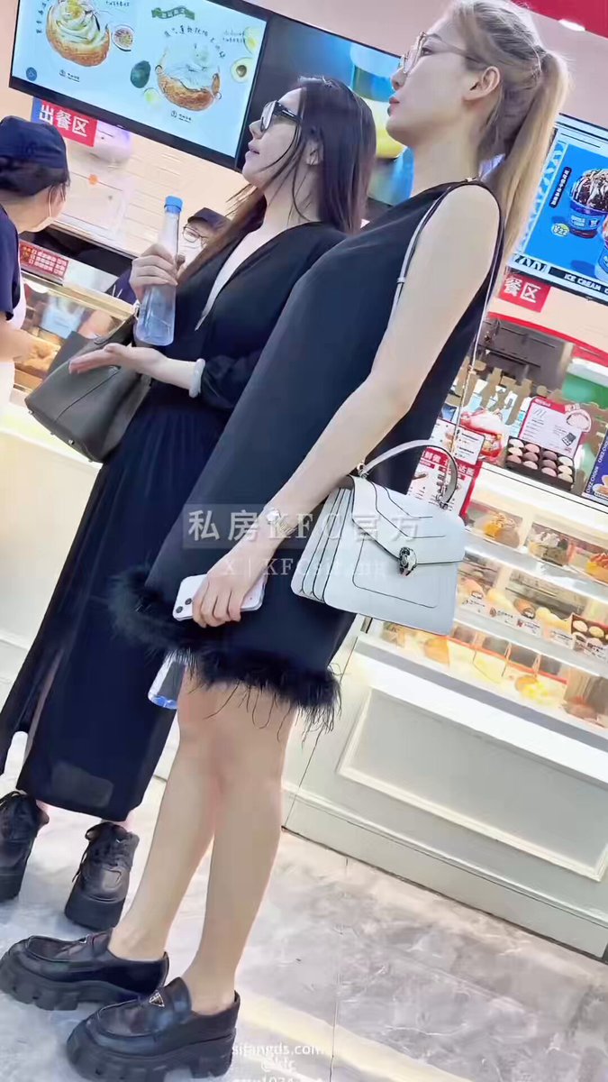Long-Legged Beauty's Feather-Skirt Wardrobe Malfunction Inside KFC — Black Stockings, Butt and Thighs Fully Exposed