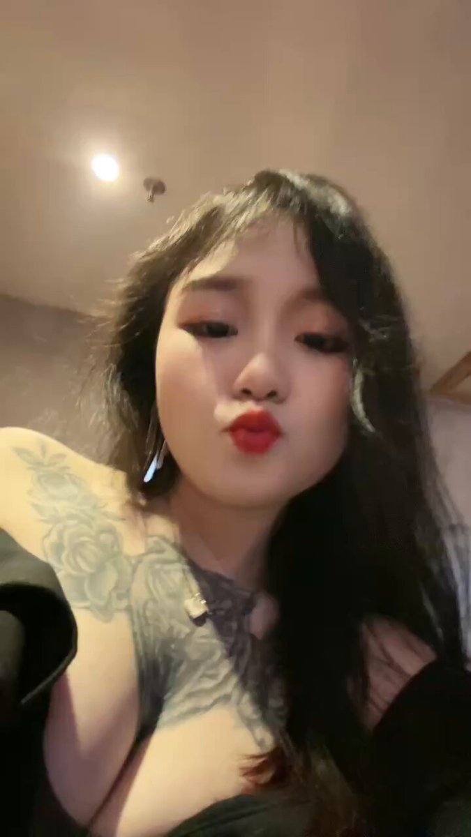 Tattooed Sexy Girl in a Deep-V Dress, Self‑Touching Her Huge Breasts to Tempt You — Red Lips Pouting to Seduce!