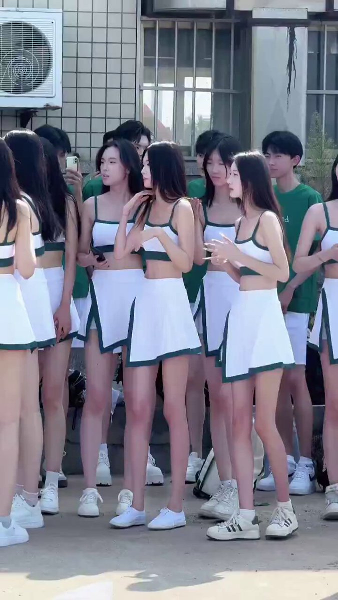School Cheerleaders in Ultra-Short Skirts Tease! Pale Long Legs Lift Skirts Together