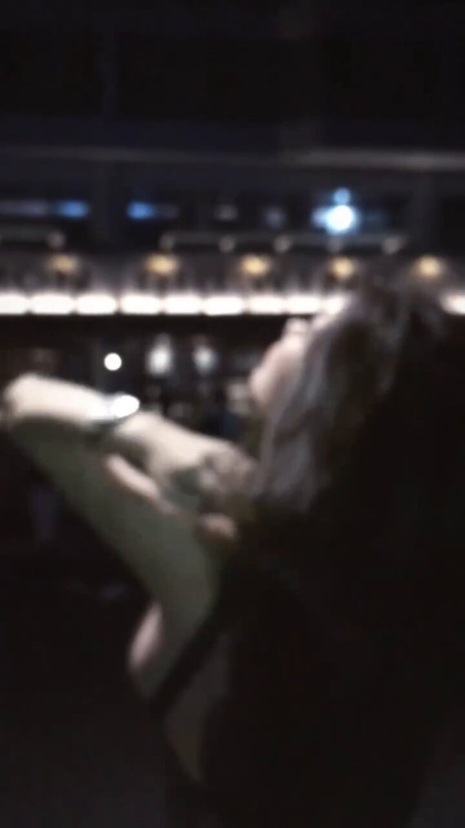 Bar babe in deep V exposing breasts, wildly teasing — nightclub outcall sexy poses